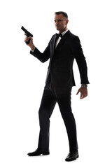 Man in suit with gun isolated on a white background for secret service agent, security or criminal...