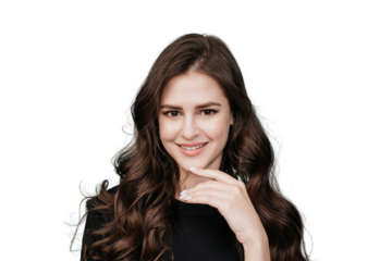 Cute brunette hispanic girl with wavy long hair looking at camera toothy smiling touching her chin against transparent background. Beauty and skincare. Pretty woman with perfect skin. Mockup.