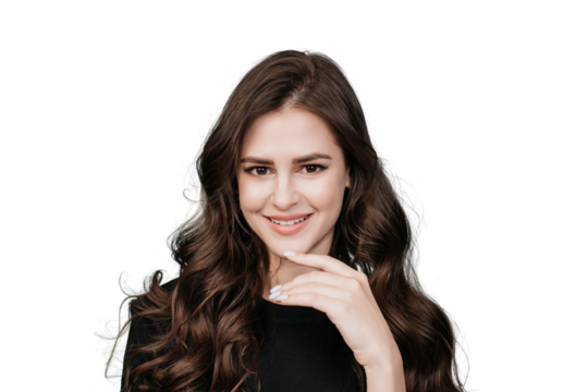 Cute brunette hispanic girl with wavy long hair looking at camera toothy smiling touching her chin against transparent background. Beauty and skincare. Pretty woman with perfect skin. Mockup.