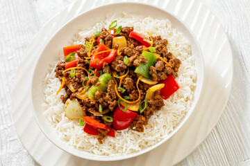 crispy ground beef with stir-fried veggies in bowl