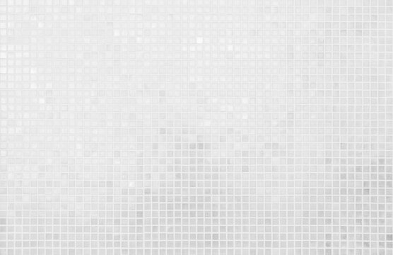 White tile checkered background bathroom floor texture. Ceramic wall and floor tiles mosaic background in bathroom.	