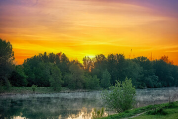 A beautiful sunrise over the river in the early morning.