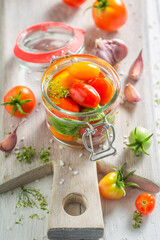 Healthy pickled tomatoes made of homegrown tomatoes.
