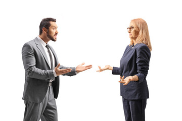 Businessman having an argument with a woman coworker