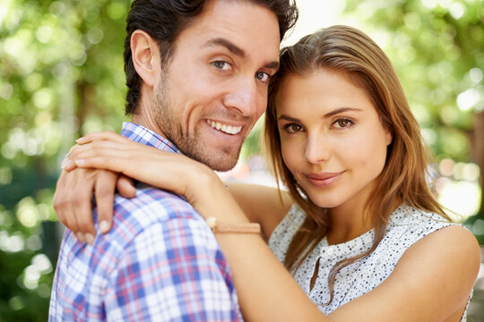 Couple portrait, hug or bonding in garden, nature or park on valentines day date, romance love or holiday. Smile, happy man or woman in embrace, relax trust or partnership support for profile picture