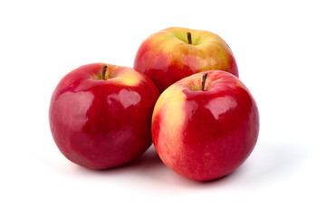 Shiny red apples, isolated on white background.