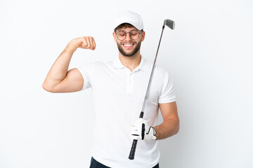 Handsome young man playing golf  isolated on white background doing strong gesture