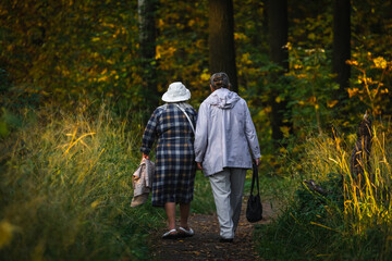 View to people walking around Bogoslovka manor complex