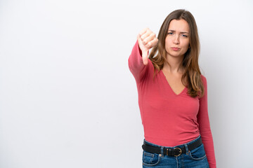 Young caucasian woman isolated on white background showing thumb down with negative expression
