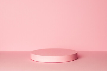 Pink product background stand or podium pedestal on empty display with pastel backdrops.