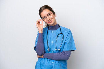 Young caucasian nurse woman isolated on white background with glasses and happy