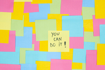 Multicolored sticky paper notes with a written message you can do it