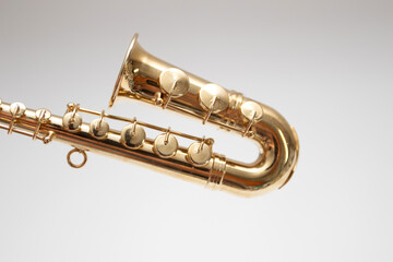 Obraz na płótnie Canvas Model of miniature saxophone model on white background