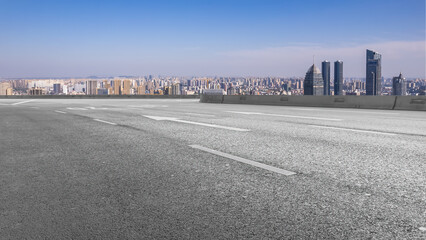 Fototapeta premium Road ground and financial district architecture