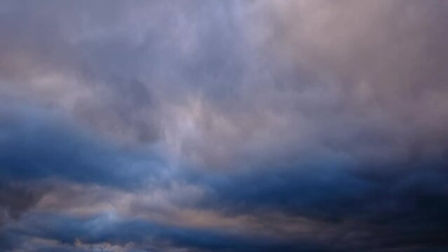 Overcast clouds timelapse at dusk.
Dark fast moving clouds shot as the sun sets.
