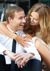 Love, city and happy couple embracing while on a date together on romantic honeymoon holiday in Italy. Excited, smile and woman hugging her husband while sitting in town for romance or anniversary.