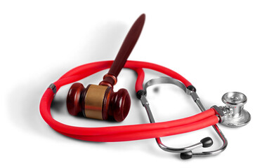 Classic brown justice wooden hammer with Medicine Stethoscope