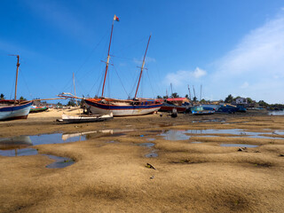 Painted fishermen's boats on the banks of the Manambolo River in Bekopaka. Madagascar