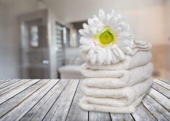 Fototapeta na wymiar Fresh clean aroma towels on table