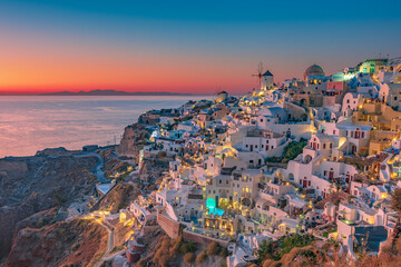 The picturesque village of Oia at dusk, Santorini island GR