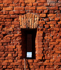 Loophole in the red brick wall in the Brest fortress