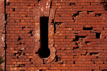 Loophole in the red brick wall in the Brest fortress