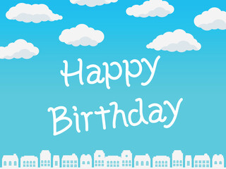 ハッピーバースデー　街並みと雲　手書き文字