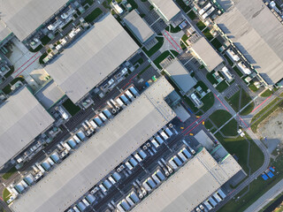 A top down aerial drone photo captures the impressive scale and design of a datacenter building, showcasing its critical role in the digital economy.