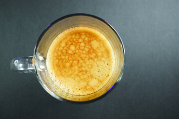 hot black coffee on black table, beverage in the morning