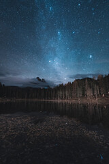Night Photography Milky way Stars of Lake Lago d'Antorno in Dolomites Italy
