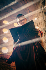 A buddhist Monk in a pagoda in Bagan Myanmar