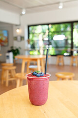 mixed berry smoothies in glass