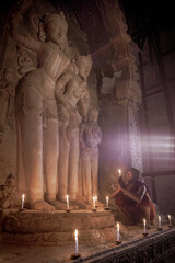 A buddhist Monk in a pagoda in Bagan Myanmar