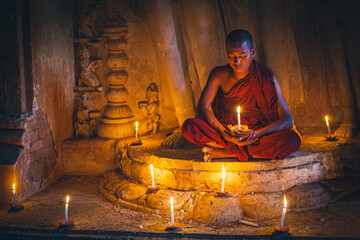 A buddhist Monk in a pagoda in Bagan Myanmar