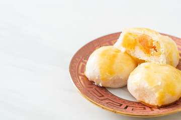 Chinese pastry moon cake with salted egg peanut or Spring Roll pastry with nuts and salted eggs