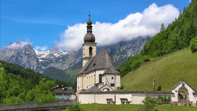 landscape in the Bavarian Alps and famous Parish Church of St. Sebastian in the village of Ramsau