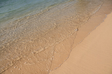 Tropical beach with sea sand on summer vacation.