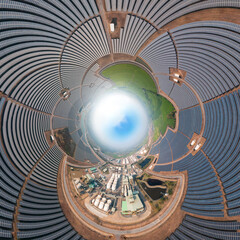 360 Wide Panoramic image of Solar Photovoltaic. Solar Photovoltaic and oil refinery. Solar plant rows array and Crude oil tanker lpg ngv, Producing alternative energy for sustainable development.
