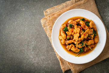 stir-fried fried fish with basil and chili in thai style