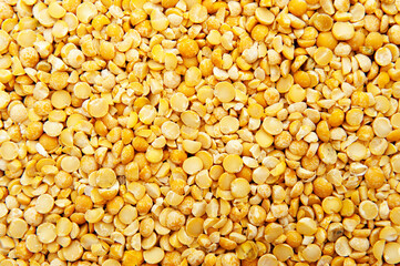 abstract background with grains of split dried yellow peas