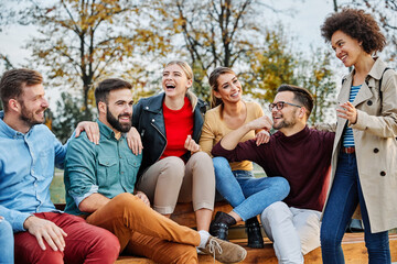 Fototapeta premium fun friend youth young group woman lifestyle friendship happy student outdoor together cheerful happiness education summer smiling man girl startup start up business