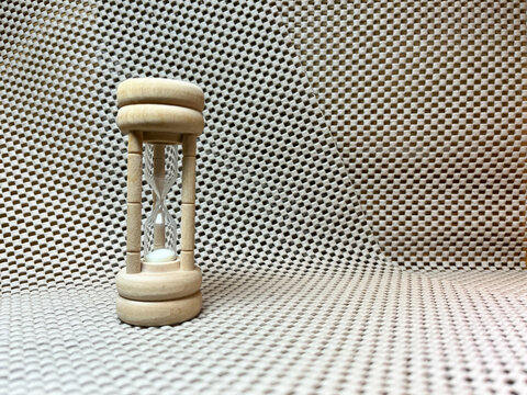 wooden hourglass and simple composition