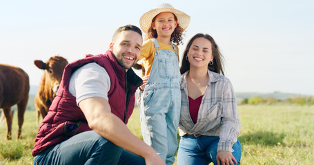 Family, farm and agriculture with a girl, mother and father on a field or meadow of grass with cattle. Sustainability, love and children with a man, woman and daughter on a farmer ranch together © A.S./peopleimages.com