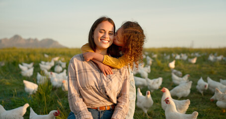 Hug, child and mother on a farm with chicken on mothers day, travel or holiday in Argentina...