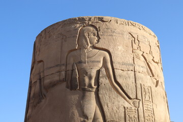 Ancient egyptian pharaoh carved on the columns of Kom Ombo temple in Aswan, Egypt 