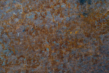 Grunge rusty metal background or texture with scratches and cracks, closeup, top view