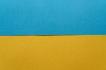Blue and yellow color paper for texture or background. Colorful soft paper background , top view, copy space