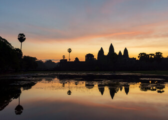 Naklejka premium The ancient city of Angkor Wat at sunrise, near Siem Reap in Cambodia. 