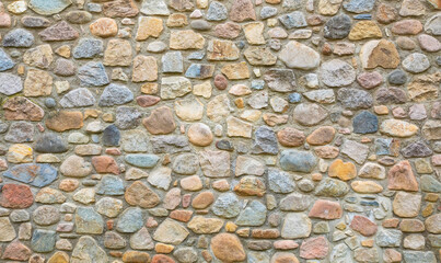 Stone wall texture with concrete, cobblestone background