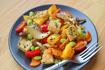 Plate of Colorful Vegetable Salad with Velvet Pioppini Mushroom and Roasted Tempeh Cubes